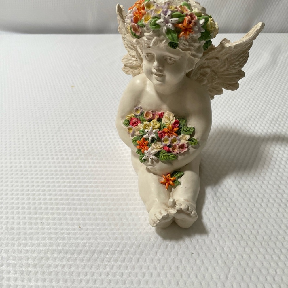 Meico Inc  Sitting Angel Figurine  holding a bouquet with Multicolor Accents